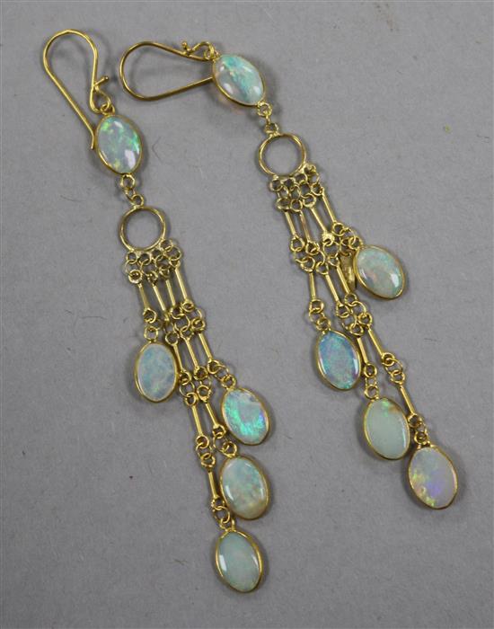 A pair of 14ct gold and white opal multi drop earrings, 49mm.